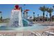 Interactive splash pad with a large dumping bucket at 891 Ocean Course Ave # 0, Davenport, FL 33896