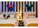 Mickey Mouse-themed bedroom with twin beds, and playful decor at 891 Ocean Course Ave # 0, Davenport, FL 33896