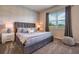 Spacious bedroom with plush bed, accent pillows, and nightstands at 891 Ocean Course Ave # 0, Davenport, FL 33896