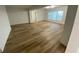 Spacious living room featuring light wood floors and an open layout at 1204 Lake Elbert Se Dr, Winter Haven, FL 33880