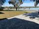 Serene lake view from a property with a paved driveway at 1204 Lake Elbert Se Dr, Winter Haven, FL 33880
