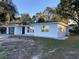 Newly renovated home with a modern exterior and fresh landscaping at 1204 Lake Elbert Se Dr, Winter Haven, FL 33880