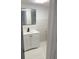Clean bathroom with white vanity and modern fixtures at 1204 Lake Elbert Se Dr, Winter Haven, FL 33880
