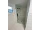 Large walk-in shower with glass enclosure and modern fixtures at 1204 Lake Elbert Se Dr, Winter Haven, FL 33880