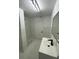 Updated bathroom with modern vanity, shower, and tile flooring at 1204 Lake Elbert Se Dr, Winter Haven, FL 33880