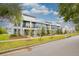 Modern townhouses with balconies and attractive landscaping at 1670 Houston St, Kissimmee, FL 34743