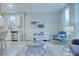 Open concept living room with modern furniture and kitchen views at 1670 Houston St, Kissimmee, FL 34743