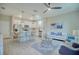 Open concept living room, kitchen, and dining area with modern decor at 1670 Houston St, Kissimmee, FL 34743
