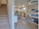 Open concept living room and kitchen with modern decor and island at 1670 Houston St, Kissimmee, FL 34743