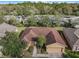 Single-Gathering home with red tile roof and two-car garage at 416 Madera Pass, Poinciana, FL 34759