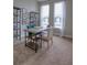 Bright home office features built-in shelving and a spacious work desk at 1690 Houston St, Kissimmee, FL 34743