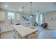 Open concept kitchen with island and living area view at 1700 Houston St, Kissimmee, FL 34743