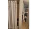 Bathroom with shower and shelving at 700 Kentucky Ave, Saint Cloud, FL 34769