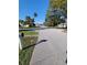 Residential street lined with mature trees and homes at 700 Kentucky Ave, St Cloud, FL 34769