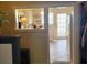 Quaint kitchen with white cabinets and a view of the backyard at 700 Kentucky Ave, St Cloud, FL 34769