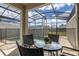 Private screened-in pool area with patio furniture at 3060 Gatsby St, Kissimmee, FL 34746