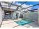 Private screened pool with adjacent patio and seating at 3060 Gatsby St, Kissimmee, FL 34746