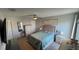 Spacious bedroom with ceiling fan and ample closet space at 305 Cascara Ln, Auburndale, FL 33823