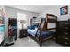 bedroom with bunk beds and ample storage at 8159 Roseville Blvd, Davenport, FL 33896