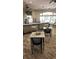 Community bar with tables and chairs at 8403 Blue Lagoon Dr, Kissimmee, FL 34747