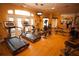 Fitness center with treadmills, elliptical, and weight machines at 8403 Blue Lagoon Dr, Kissimmee, FL 34747