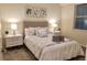 Cozy bedroom with plush bedding, nightstands and ample closet space at 3131 Paradox Circle # 207, Kissimmee, FL 34746