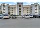 Modern building exterior with ample parking and convenient curbside access at 3131 Paradox Circle # 207, Kissimmee, FL 34746