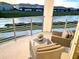 Relaxing balcony offering scenic water views and comfortable seating at 3131 Paradox Circle # 207, Kissimmee, FL 34746