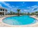 Enjoy this large community pool with plenty of lounge chairs at 3131 Paradox Circle # 207, Kissimmee, FL 34746