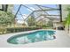 Inviting enclosed pool area with plenty of sunlight at 7920 Summer Ridge Pl, Orlando, FL 32819
