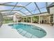 Large enclosed pool with plenty of space for relaxation at 7920 Summer Ridge Pl, Orlando, FL 32819