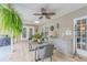 Outdoor kitchen with granite countertops and seating area at 7920 Summer Ridge Pl, Orlando, FL 32819