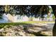 White building with multiple windows and doors at 6747 Whispering Pines Rd, Orlando, FL 32824