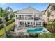 Two-story home with pool and patio at 1217 Radiant St, Reunion, FL 34747