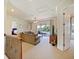 Spacious bonus room with comfy seating and access to balcony at 1217 Radiant St, Reunion, FL 34747