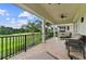 Covered balcony overlooking a golf course at 1217 Radiant St, Reunion, FL 34747