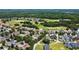 Aerial view of community near golf course at 1217 Radiant St, Reunion, FL 34747