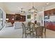 Open living room with built-in shelving and access to outdoor space at 1217 Radiant St, Reunion, FL 34747