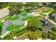 Aerial view of community amenities including a playground and mini golf course at 1217 Radiant St, Reunion, FL 34747