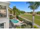 Resort-style pool and spa with patio and golf course views at 1217 Radiant St, Reunion, FL 34747