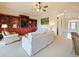 Spacious living room with comfortable seating and built-in shelving at 1217 Radiant St, Reunion, FL 34747