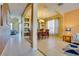 Bright dining room with wooden table and chairs at 4690 Golden Beach Ct, Kissimmee, FL 34746