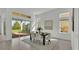 Spacious dining room with sliding glass doors leading to backyard at 2686 Meadowedge Loop, Saint Cloud, FL 34772