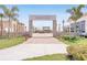 Emerson Plaza community entrance with a stone archway and paved pathway at 2686 Meadowedge Loop, Saint Cloud, FL 34772