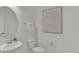 Clean powder room with white vanity and toilet at 2686 Meadowedge Loop, Saint Cloud, FL 34772