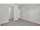 Spacious bedroom with gray carpet and walk-in closet at 2686 Meadowedge Loop, Saint Cloud, FL 34772