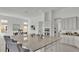 Open concept kitchen with large island and granite countertops at 2686 Meadowedge Loop, Saint Cloud, FL 34772
