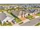 Aerial view of a neighborhood with houses and street at 2686 Meadowedge Loop, Saint Cloud, FL 34772