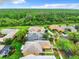 Aerial view showing home's private backyard and neighborhood at 153 Marabella Loop, Poinciana, FL 34759