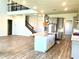 Open concept kitchen with large island, stainless steel appliances, and ample cabinet space at 8059 Leaf Grove Cir, Orlando, FL 32836